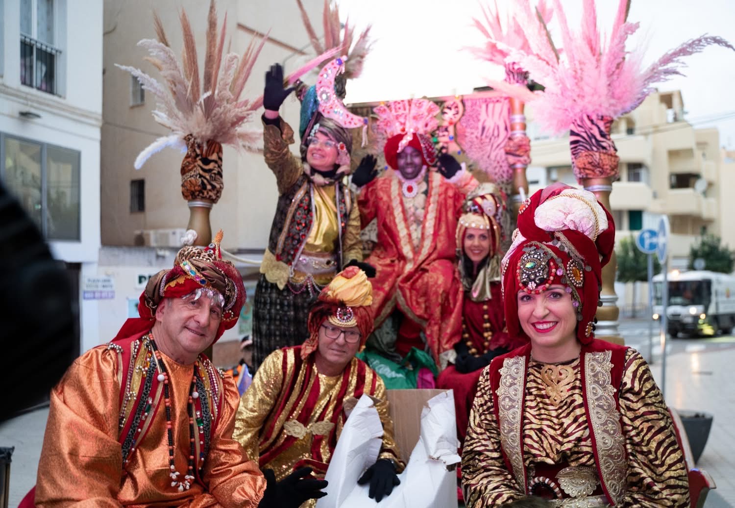 People dressed as the Three Kings on a float during